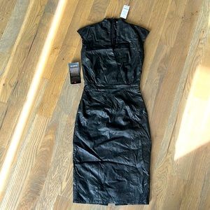 Petite Black Faux leather dress. Fitted Surplice dress